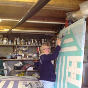 Lynda painting one of the three beach huts, for our new 'Garden Residents,' to live in. Namely, Billy, Bertha and Betty!