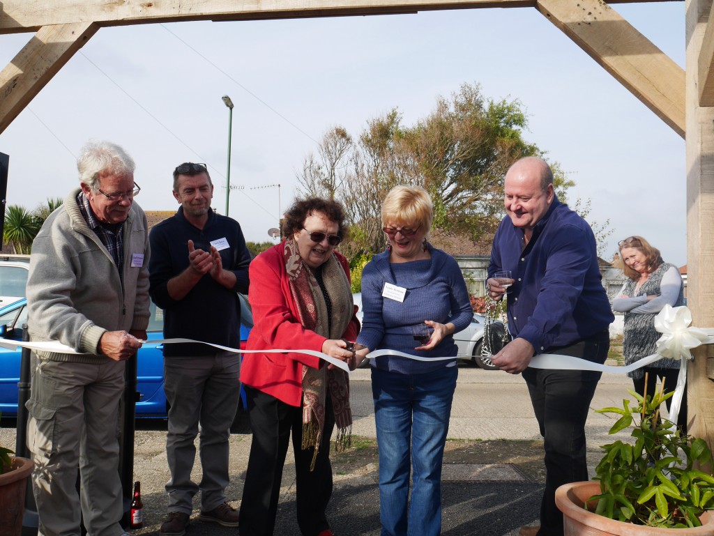  Councillor Janet Mockridge WSCC cutting the ribbon with West Beach Committee member Lynda McShane. Looking on Councillors Mick Clark WSCC and Geoff Patmore ADC, not forgetting our Chairman Chris Drew.